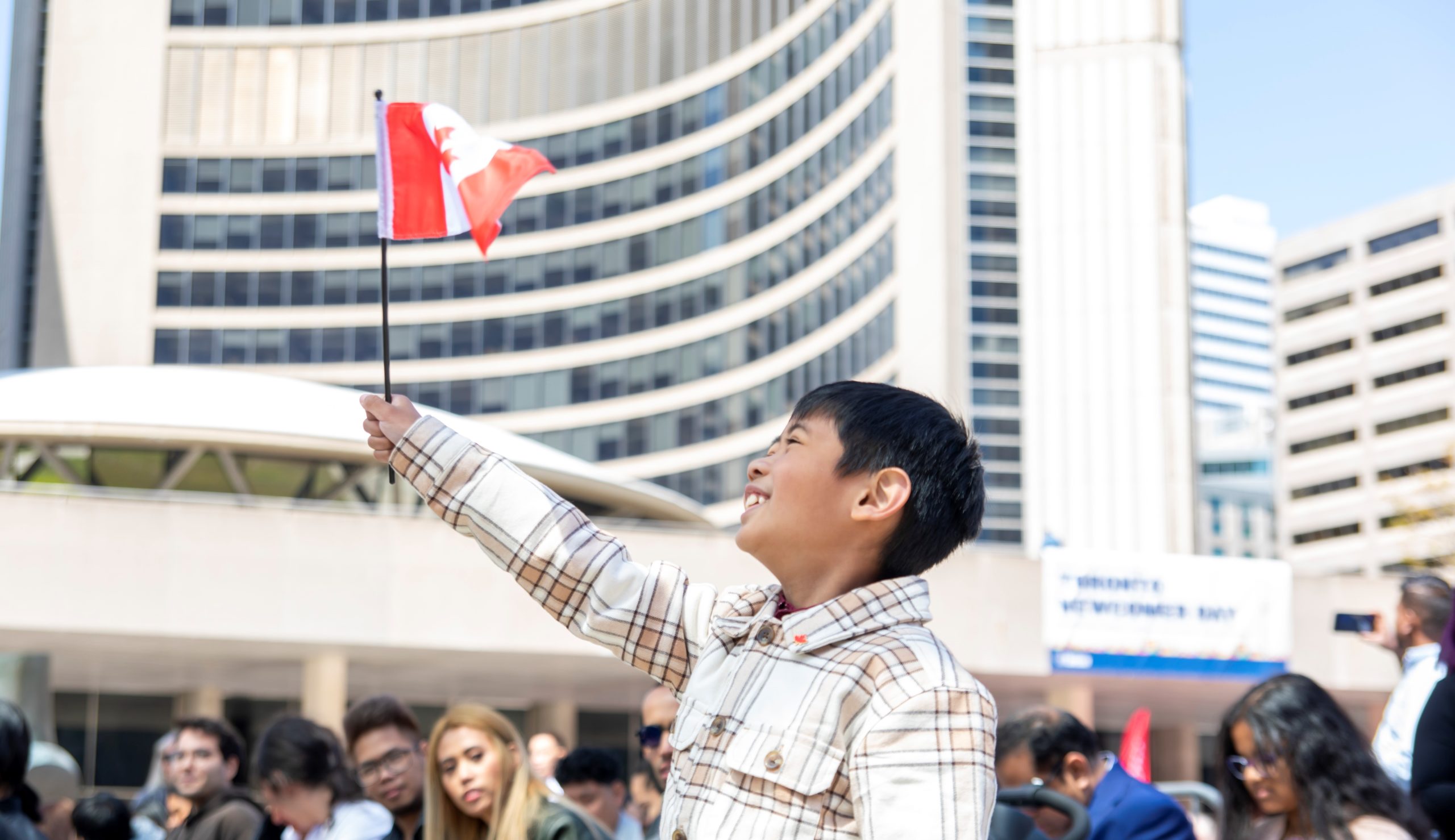 People take part in a Canada Day citizenship ceremony before the