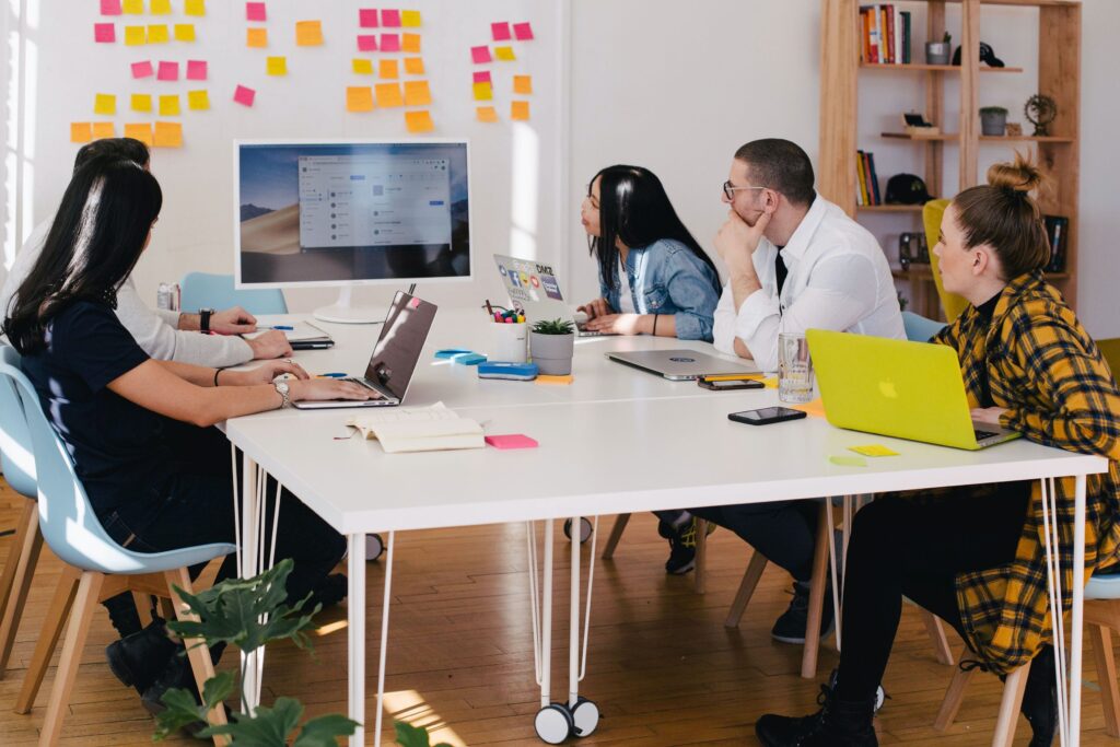 Group presentation in a work environment.