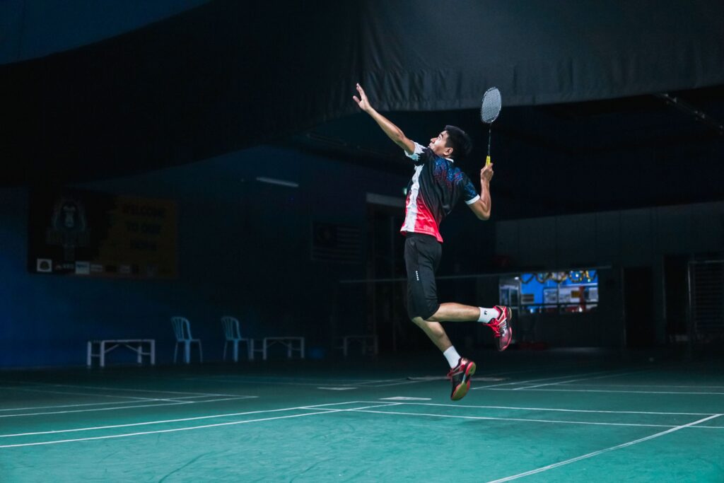 Person playing badminton.