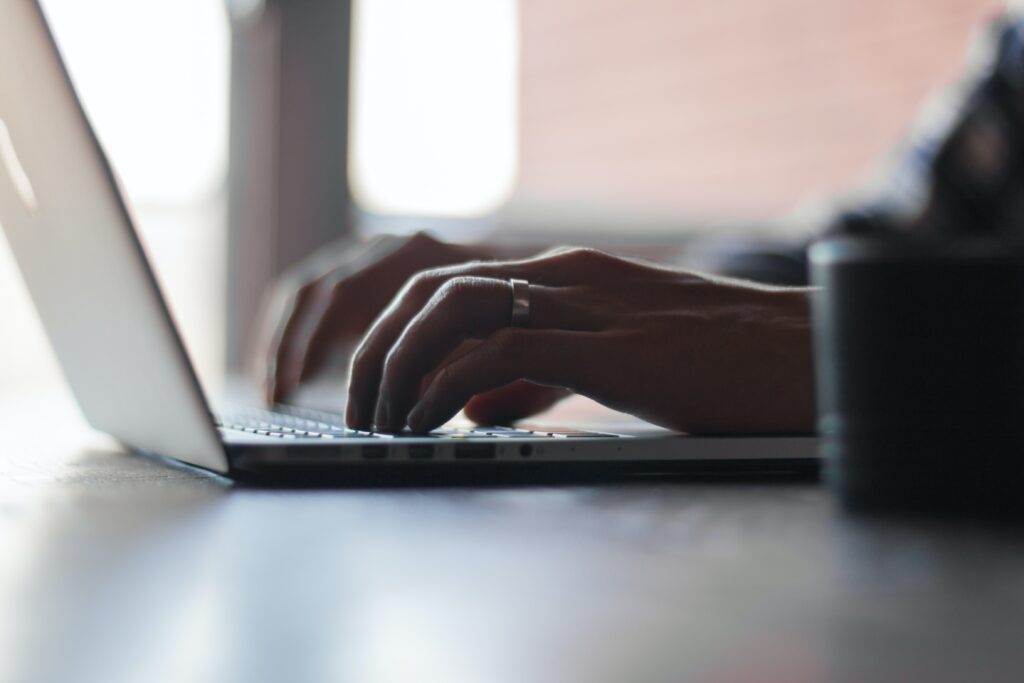 Person applying for Canadian citizenship on a laptop.