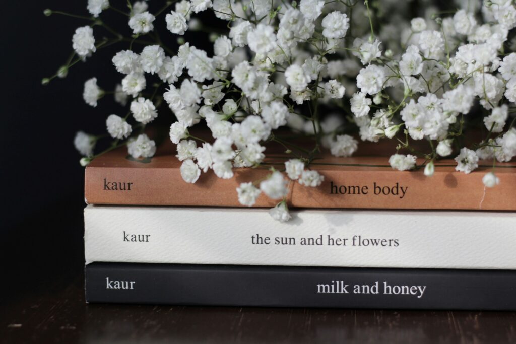 Photo of poetry books by Rupi Kaur.