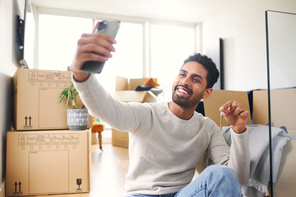 A person celebrating in their new home.