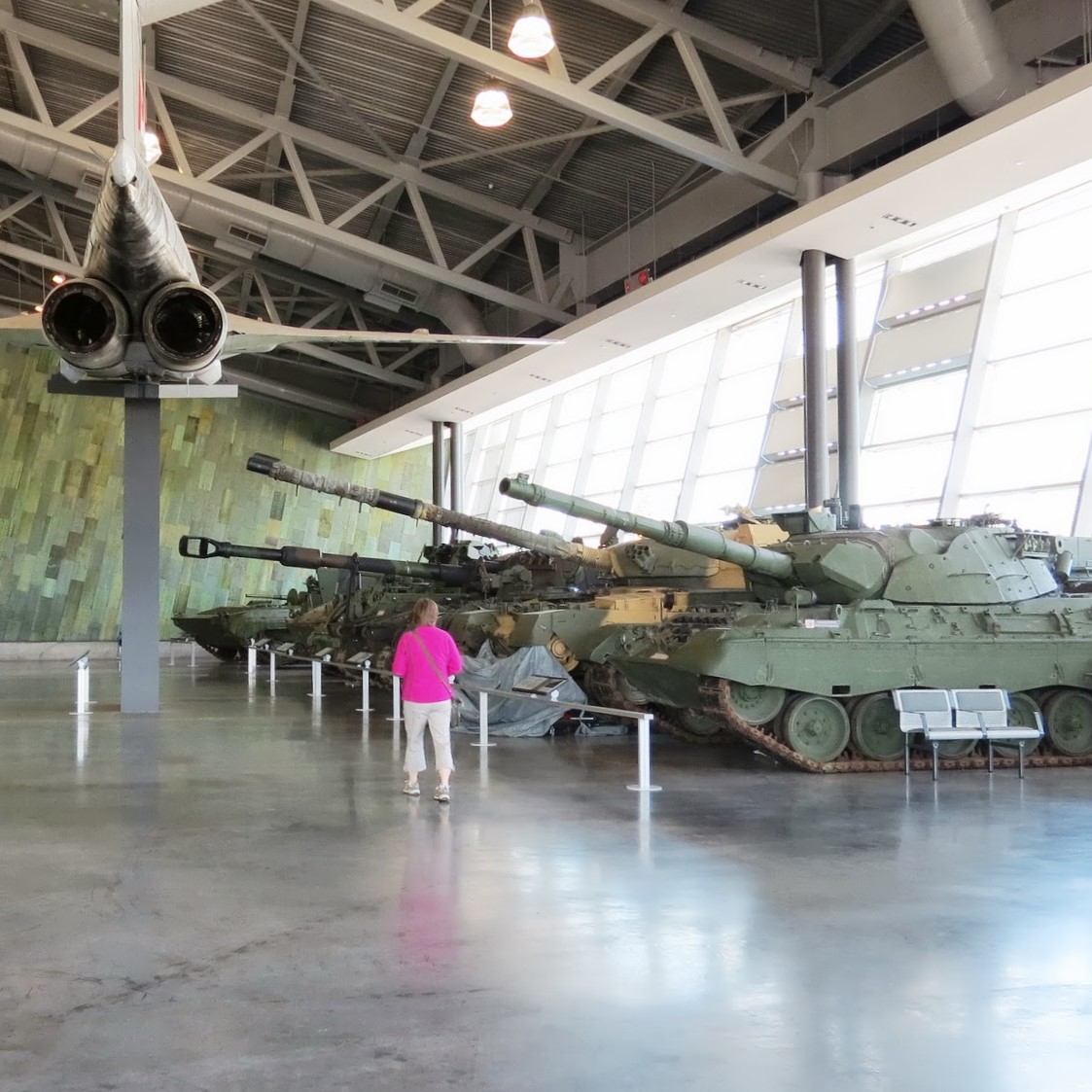 Parent walking through the Canadian War Museum.