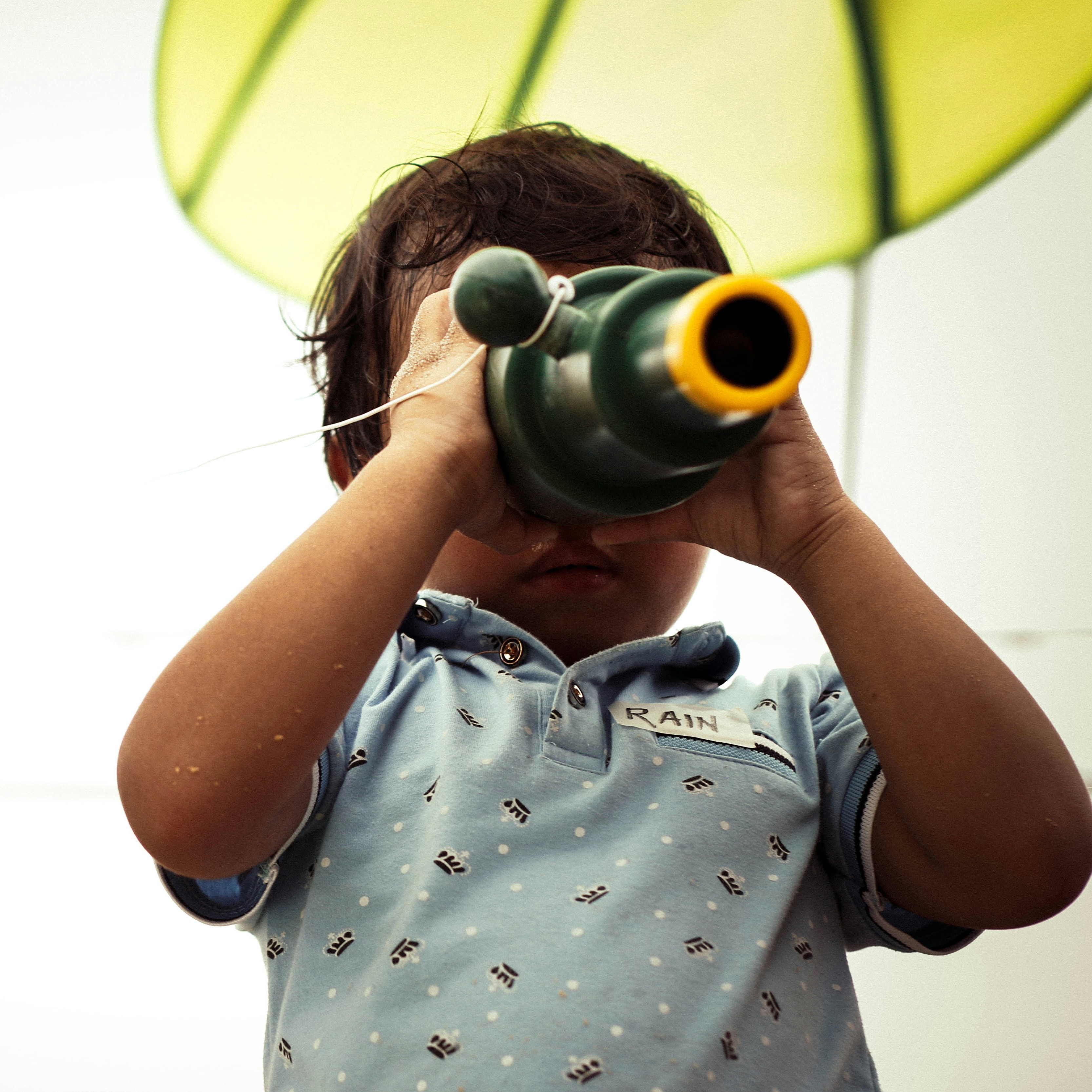 Child playing with a telescope at the Science and Technology Museum in Ottawa.