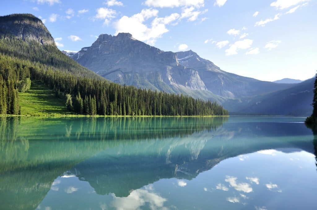 glacial lake surrounded by mountain in nature