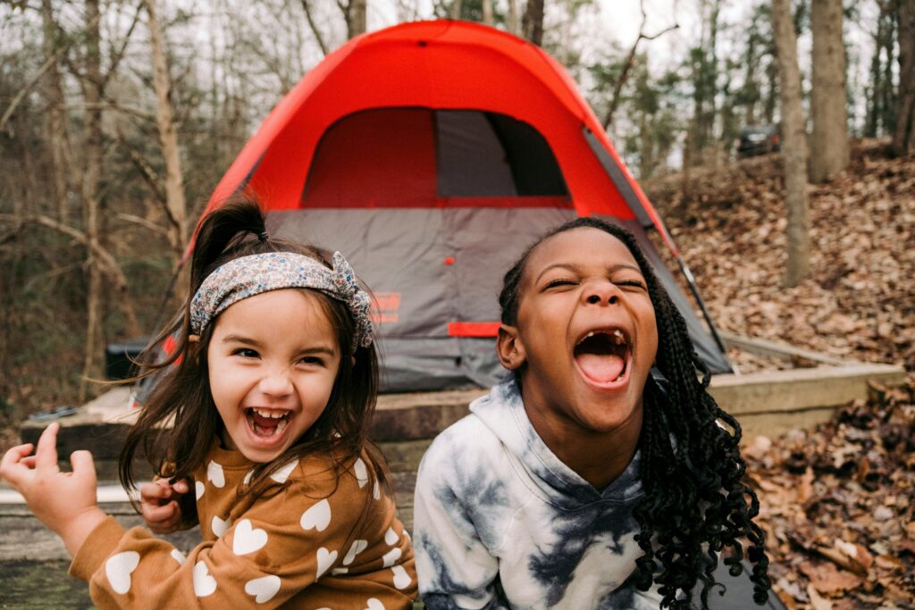 Young children camping for the first time.