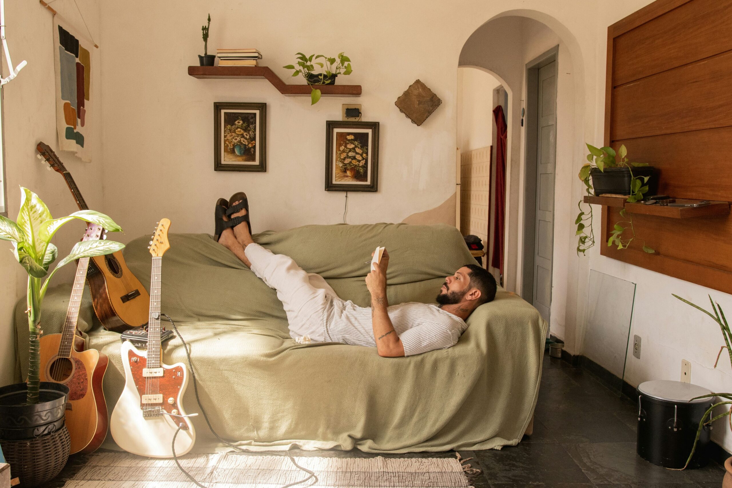 A man reading while he rests on a long weekend off work.