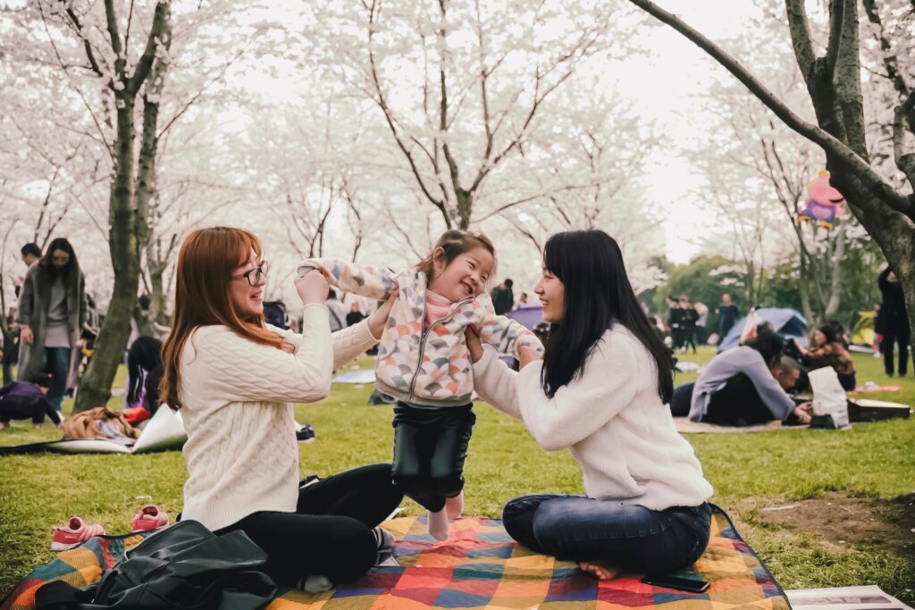 A family enjoying a springtime picnic.