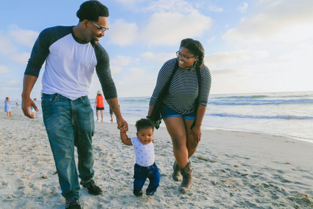 A family enjoying a summer weekend on a beach.