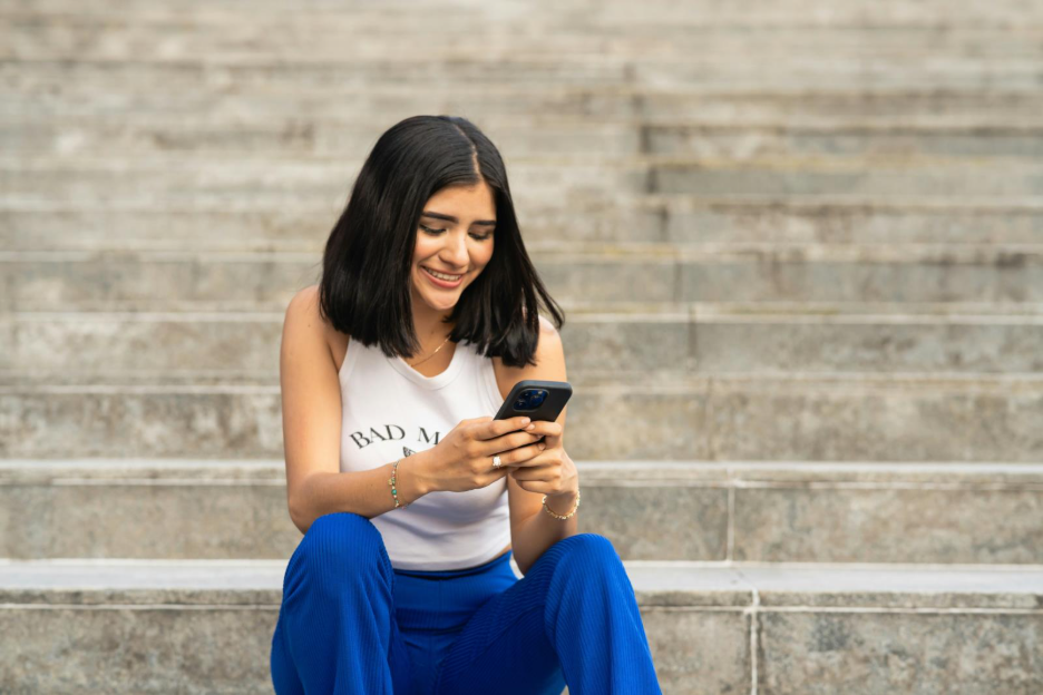 Image of person using the Beacon app for sending money.