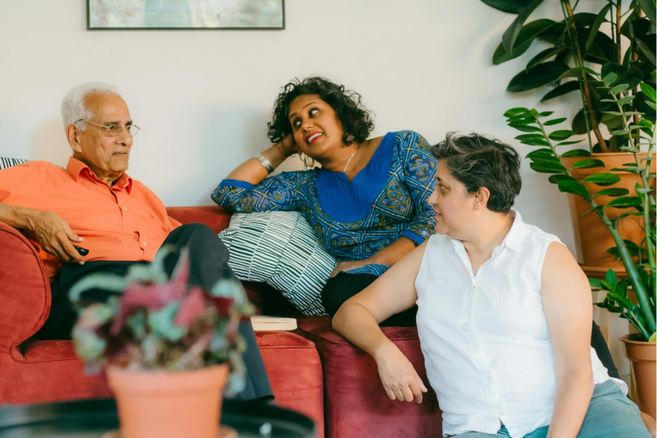 A family on a couch.